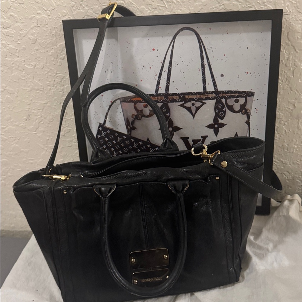 SeeByChloe Elegant Black Leather Satchel with Gold Details